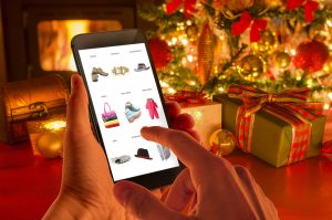 Christmas online shopping with phone. Online audience